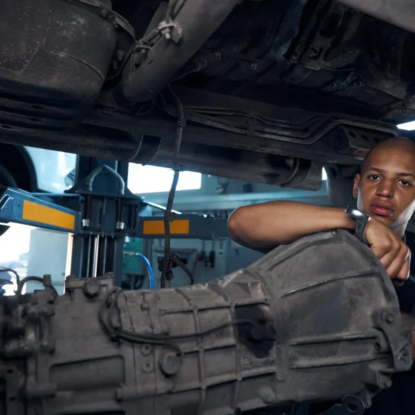 concentrated-african-american-car-mechanic-resting-2025-03-09-01-49-06-utc